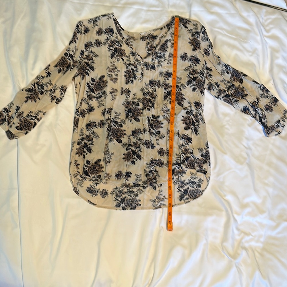 Women’s lightweight beige and floral print blouse